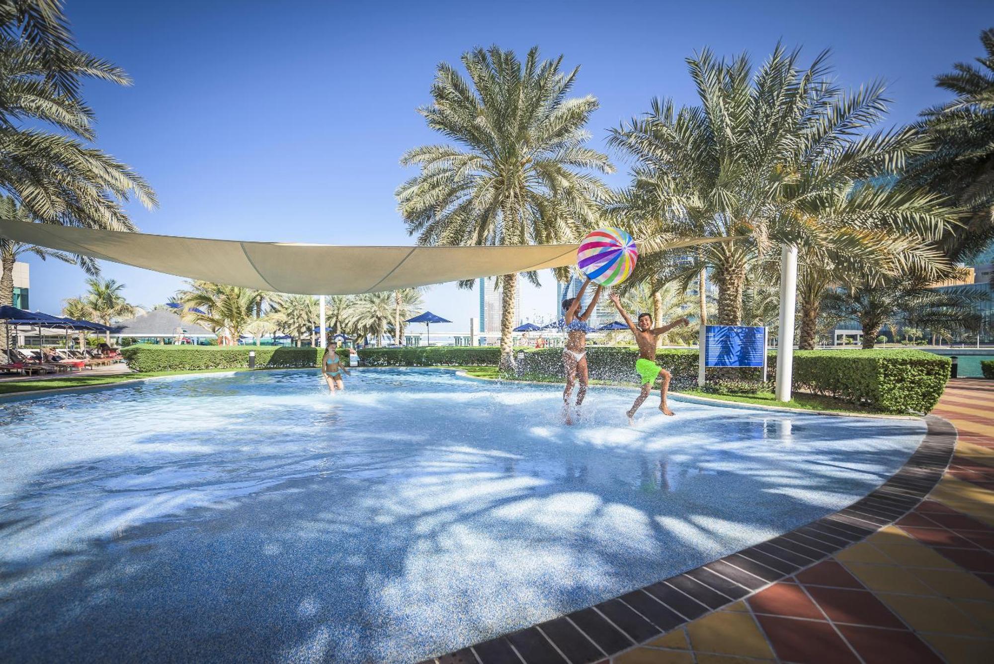 Beach Rotana - Abu Dhabi Exterior photo The swimming pool at the resort